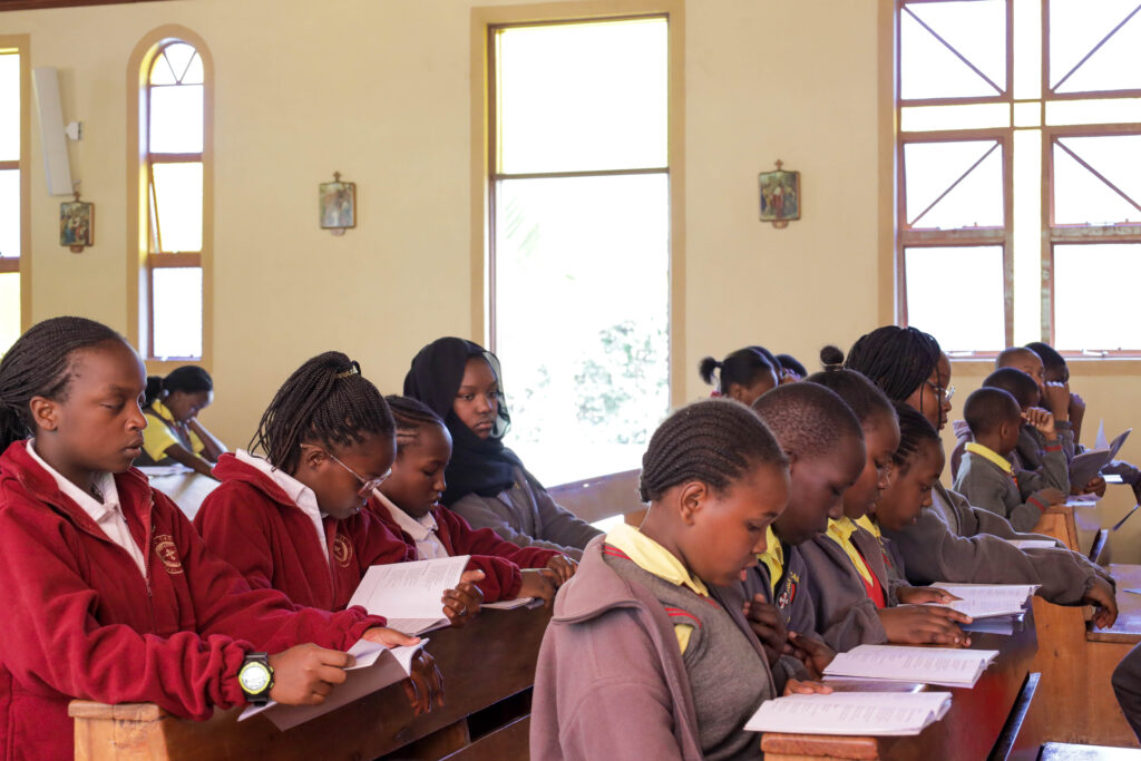 Holy Cross Catholic International School; Prayer time.